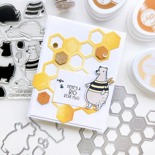 "Here's a Big bear hug" card with a bear, accented with a honeycomb background and a splash of sequin.