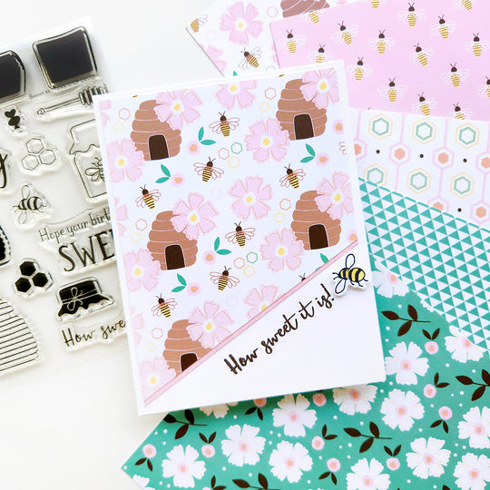 "How Sweet It Is" card featuring a buzzing bee next to floral, honeycomb, and bee-patterned paper.