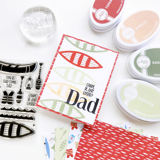 "Canoe be any cooler, Dad?" card with multiple canoes on a fun, whimsical patterned paper background.