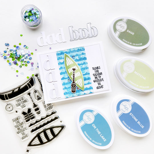 “Dad, thanks for teaching me to navigate the waves” card featuring a canoe and paddle floating on wavy water background.