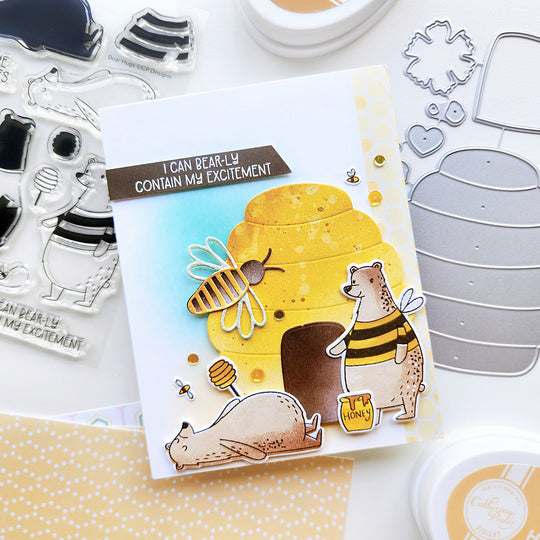 "I can Bearl-ly contain my excitement" card featuring bears by a beehive, accented with buzzing bees and sequins.
