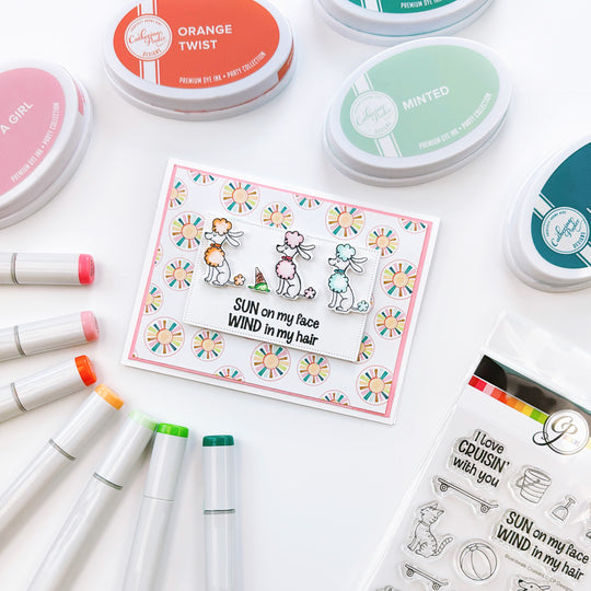 3 poodles card, sunburst background.