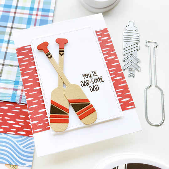 “You’re Oar-some, Dad” card with two decorative paddles set against fun, whimsical, patterned paper.