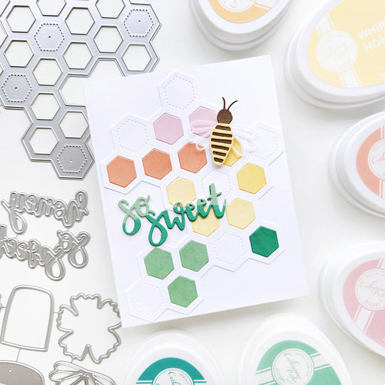 "So Sweet" card with bee atop colorful honeycomb shapes.