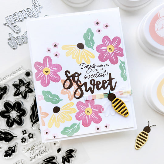 "So Sweet Days with you are the sweetest" card with a bee set on a floral background.