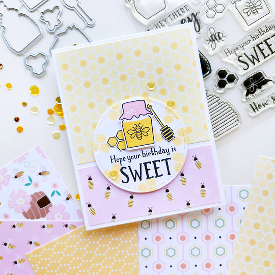 "Hope Your Birthday Is Sweet" card with a honey jar, honeycomb and bee-patterned paper, accented with sequins.