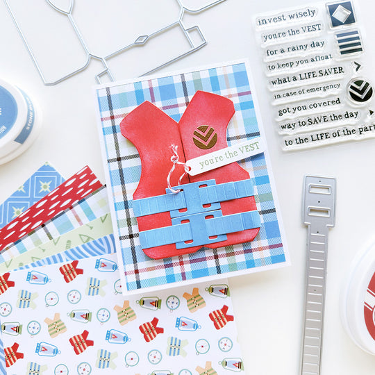 “You're the vest!” card featuring a life vest embellishment layered over plaid patterned paper.