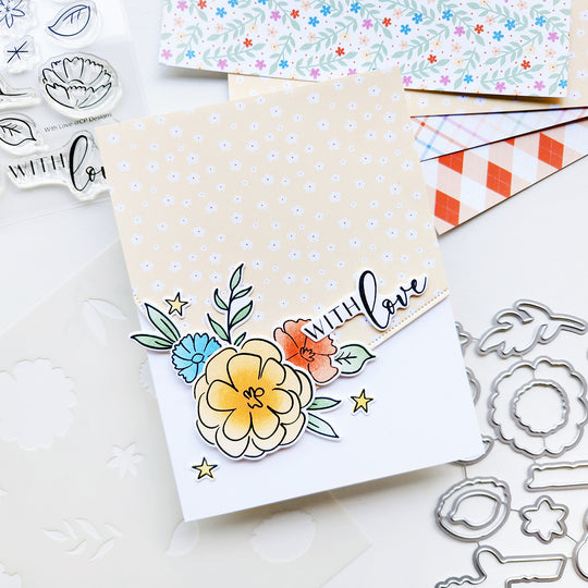 Floral card with patterned paper on a white background