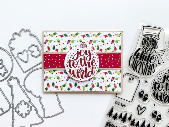 Ornament with Joy to the world sentiment on stocking background