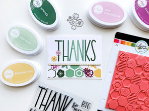 Beehive Background Stamp with Thanks Sentiment in Green, Purple, and Yelllow