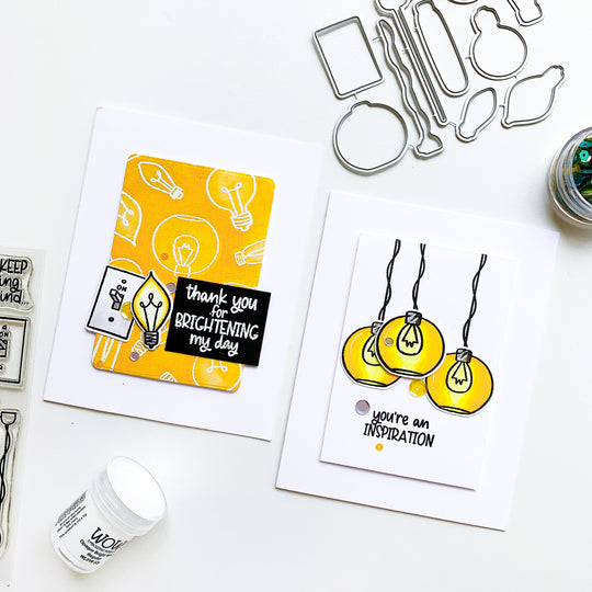 Two cards with light bulbs and patterns