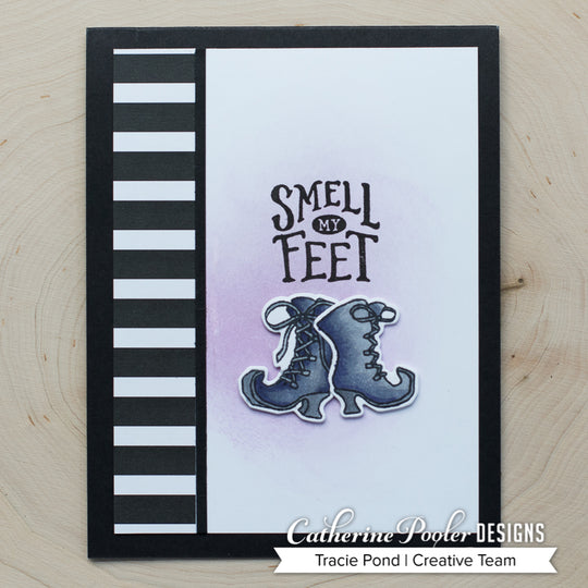Smell my feet sentiment with witch boots and striped border
