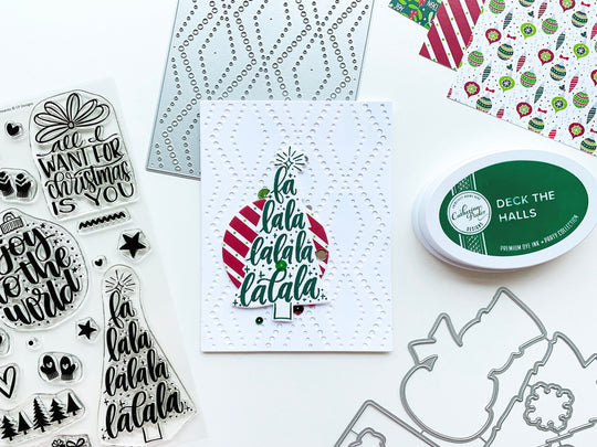 Christmas tree and ornament on white dotted zig zag background