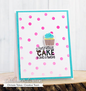 card with scattered circles and a cupcake