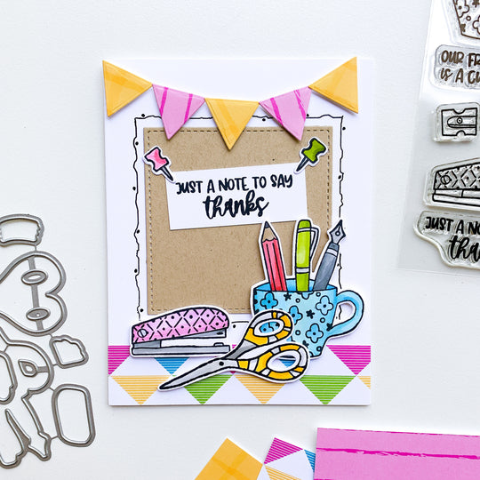 Cork Board with desktop treasures in front