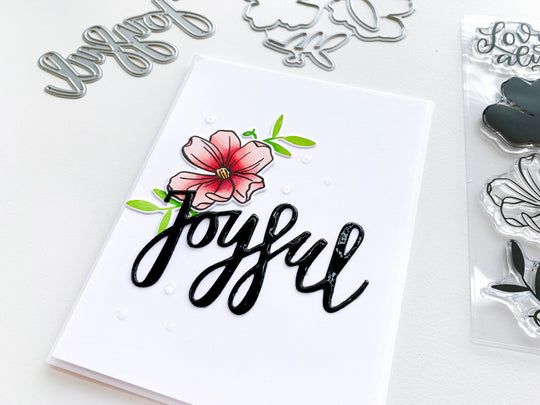 Cutout Joyful over dogwood flowers