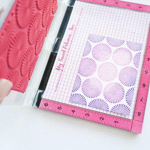 Dotted Burst Background Stamp stamped out with a Misti