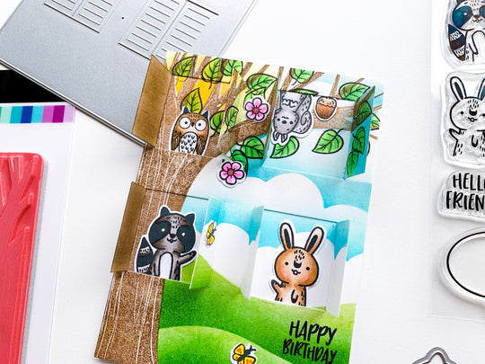 Critter Crew animals in window frames tree home