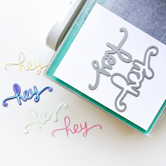 Cutting Hey Word dies on a Sizzix Big Shot