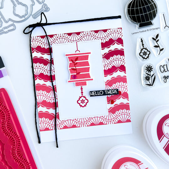 Red Ombre lantern over ombre stamped fan dance background card
