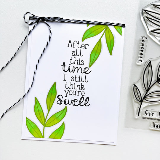 card with natural flourishes and sentiment