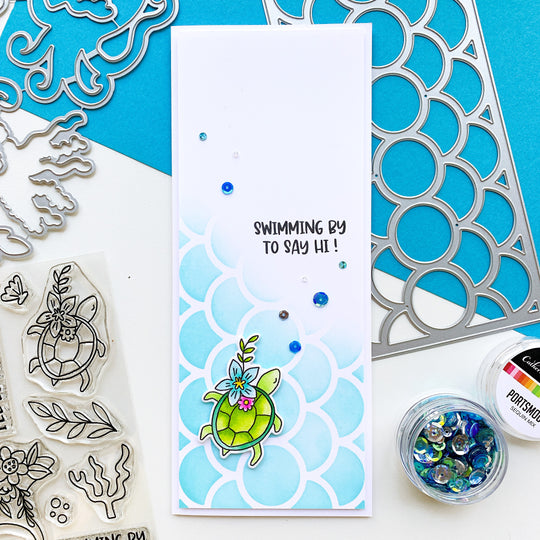 slimline card with ocean chums stamps and portsmouth sequins