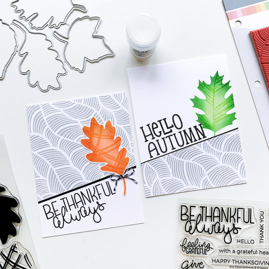 Light as a feather background with colored leaves cards