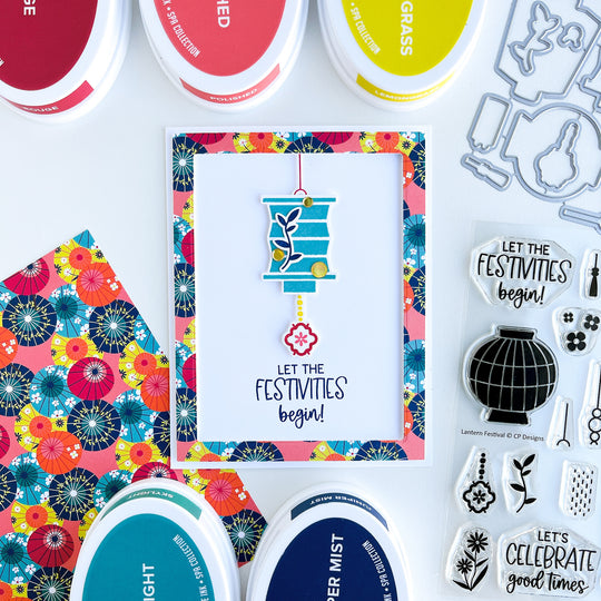 Blue lantern over floral patterned paper card