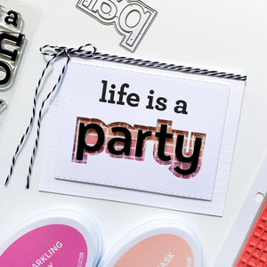 Life is a party card with scribble grid background stamp