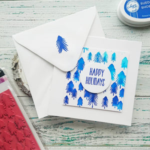 happy holidays card with one fine pine background