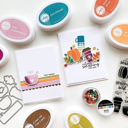 two cards with pumpkin season stamps next to coordinating ink pads