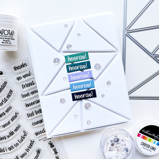 Hooray card using Round About Messages stamp set, Capture the Flag cover plate die, Crater Lake sequin mix, Wow! Opaque Bright White Regular embossing powder and assorted ink pads.