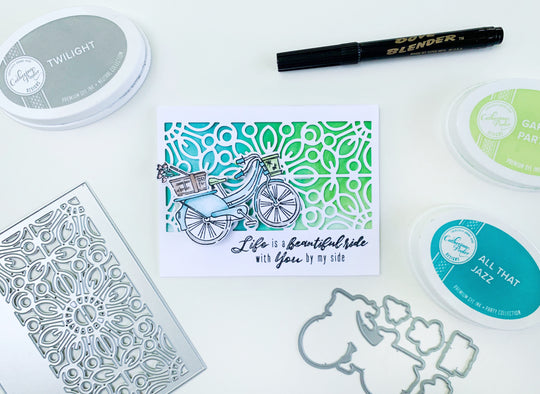 card with bicycle stamp and savannah cover plate die