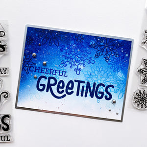 cheerful greetings card with scrolling snowflakes