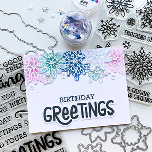 birthday greetings card with scrolling snowflakes