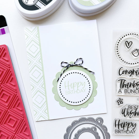 Happy Birthday card using Scallop Tag Duo dies, Every Occasion Sentiments stamps, Simply Diamonds background stamp, twine, Midnight and Wintergreen ink pads.