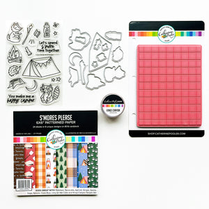 S'mores Please bundle includes Happy Camper stamp set, Happy Camper dies, Cozy Plaid background stamp, S'mores Please patterned paper and Kings Canyon sequin mix.