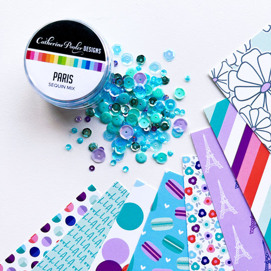 Paris Sequin Mix next to patterned paper
