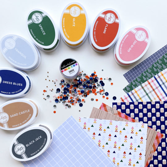 Woodsy Patterned Paper next to ink pads and sequins