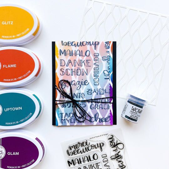 card with world of thanks sentiments over rainbow wavy lines background