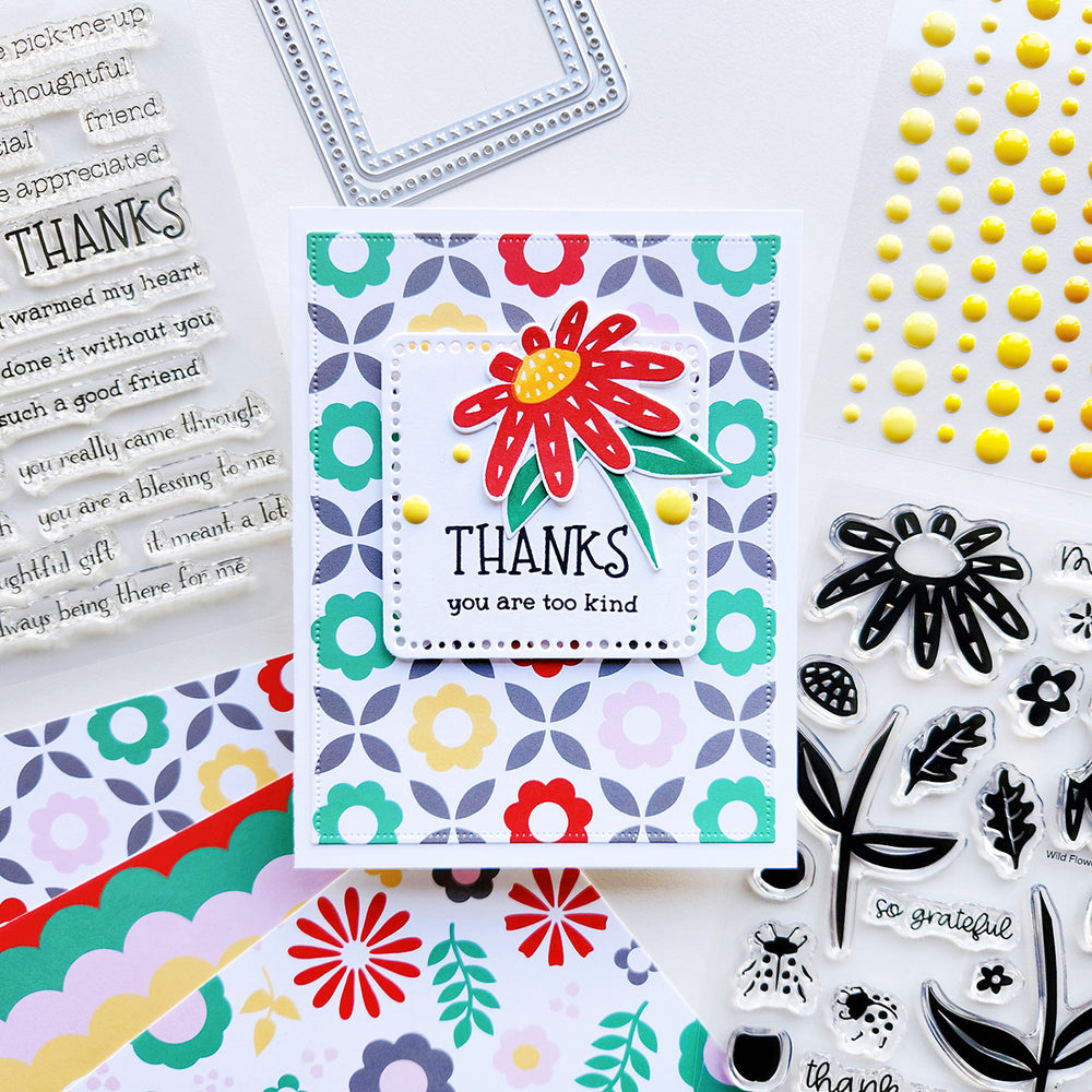 Handmade thanks card with Samba Flower using the Wild Flowers stamp set over a Totally Bloomin' Paper sheet.