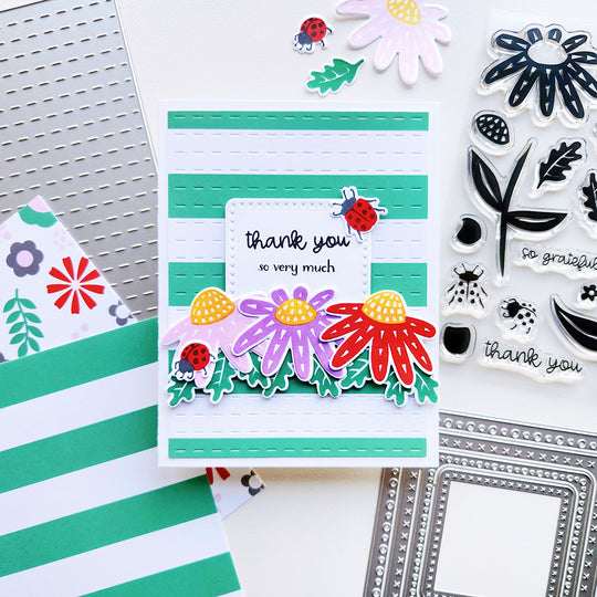 Handmade thanks card with Channel Strip Struped background and colorful flowers using the Wild Flowers stamp set.