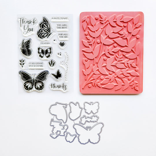 Set of butterfly-themed stamps, dies, and background stamp included in the Flutters & Thanks bundle