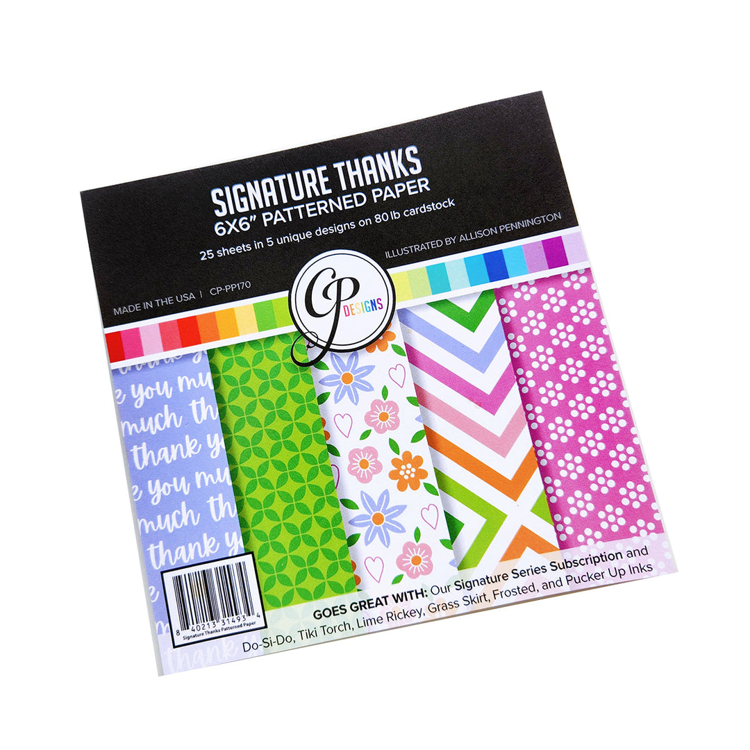 Packaged patterned paper with colorful designs on a white background