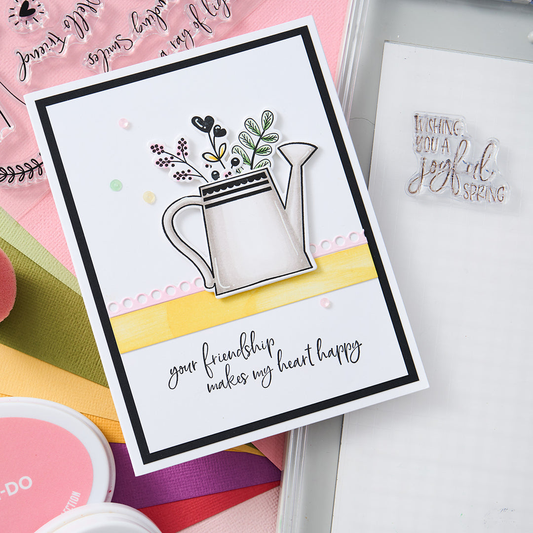 Your friendship makes my heart happy! This sweet card features a watering can filled with twigs and berries.