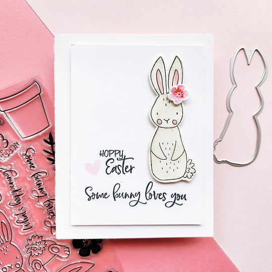 Hoppy Easter! Some bunny loves you! Celebrate with this sweet card featuring a grey bunny and a floral accent.