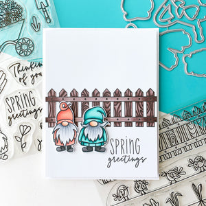 Spring Greetings with two gnomes and a picket fence