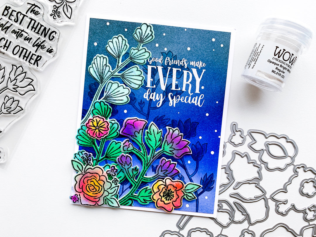 Blue blended background with Best Things in life floral over top