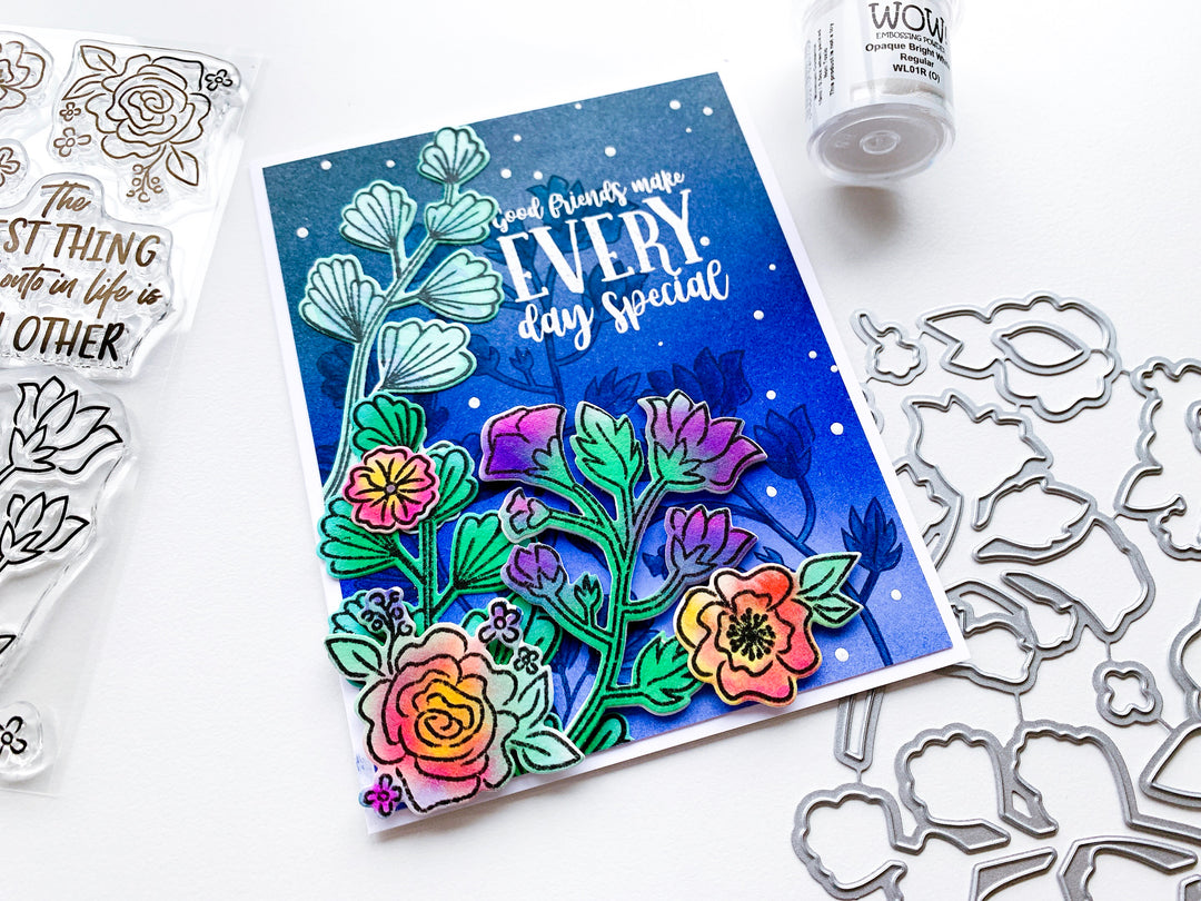 Blue blended background with Best Things in life floral over top