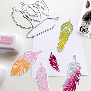 die cut colorful feathers 